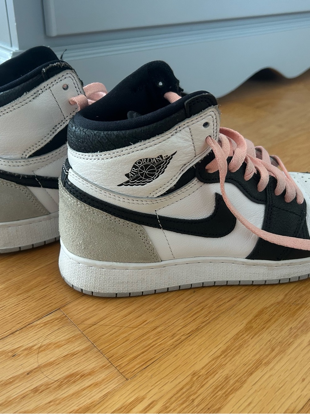 Jordan Women's High-Top Sneakers in White/Black with Pink Laces